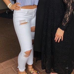 white distressed american eagle jeans